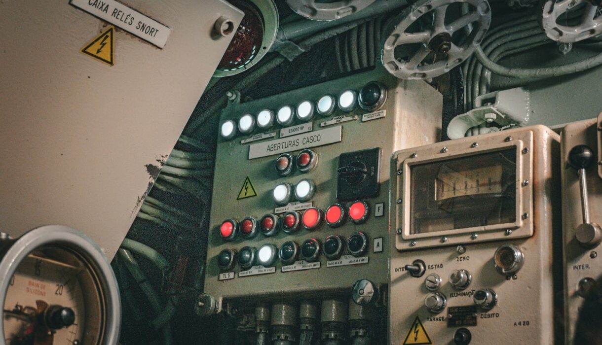 A control panel covered in buttons and dials