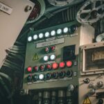 A control panel covered in buttons and dials